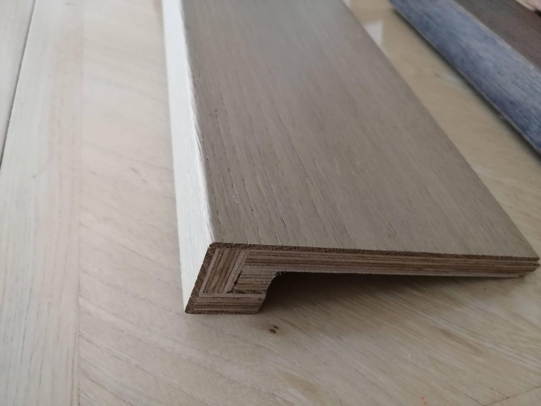 Custom stair nosing made to match hardwood flooring with a clean finished edge