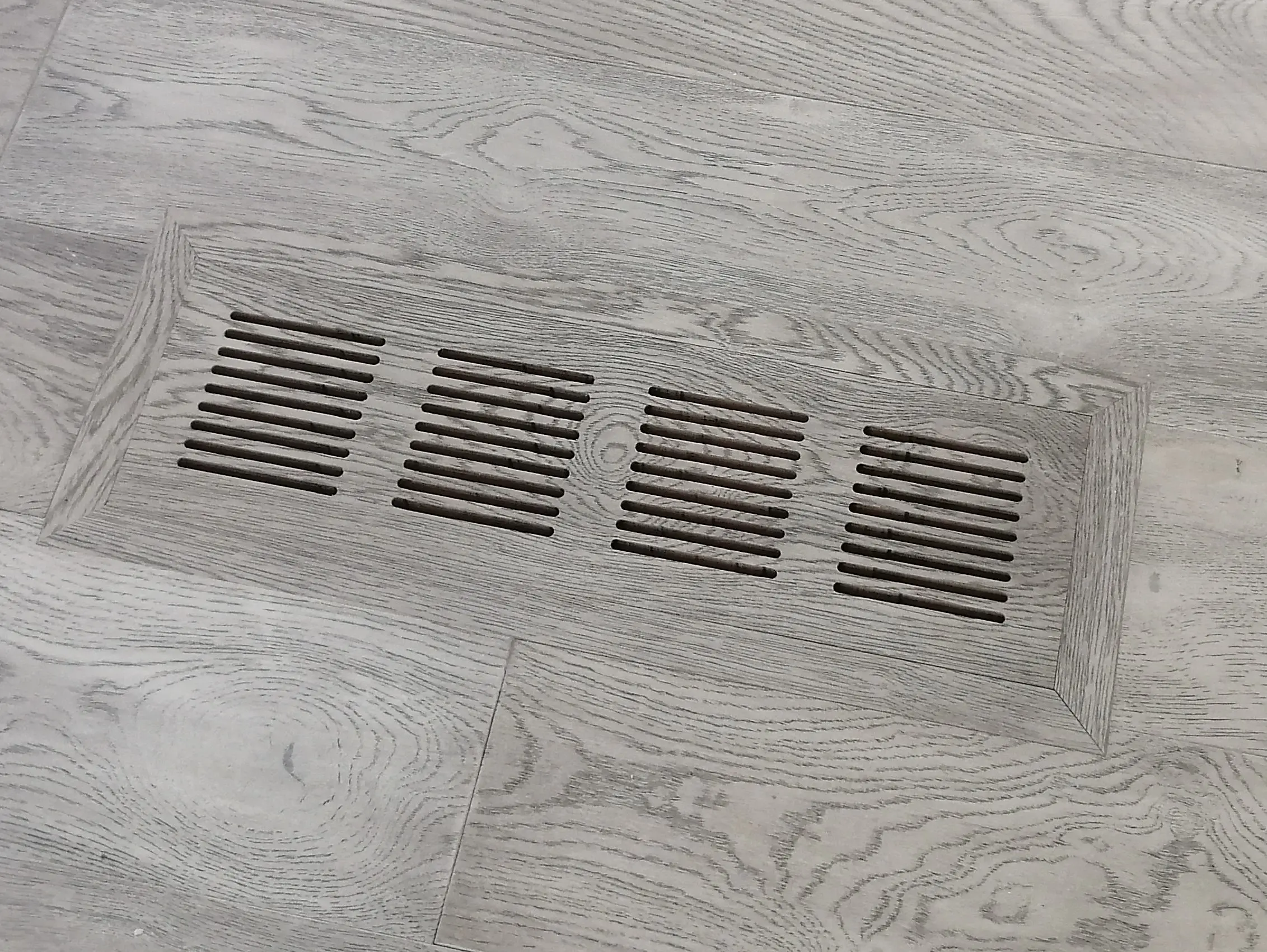Matching wood flooring accessory installed with a clean finished look