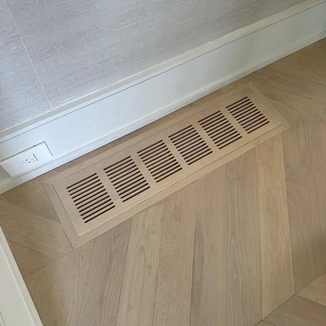 Custom flush mount wood vent cover made to match the hardwood floor